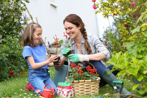 Gardener inspecting a garden before addressing a complaint